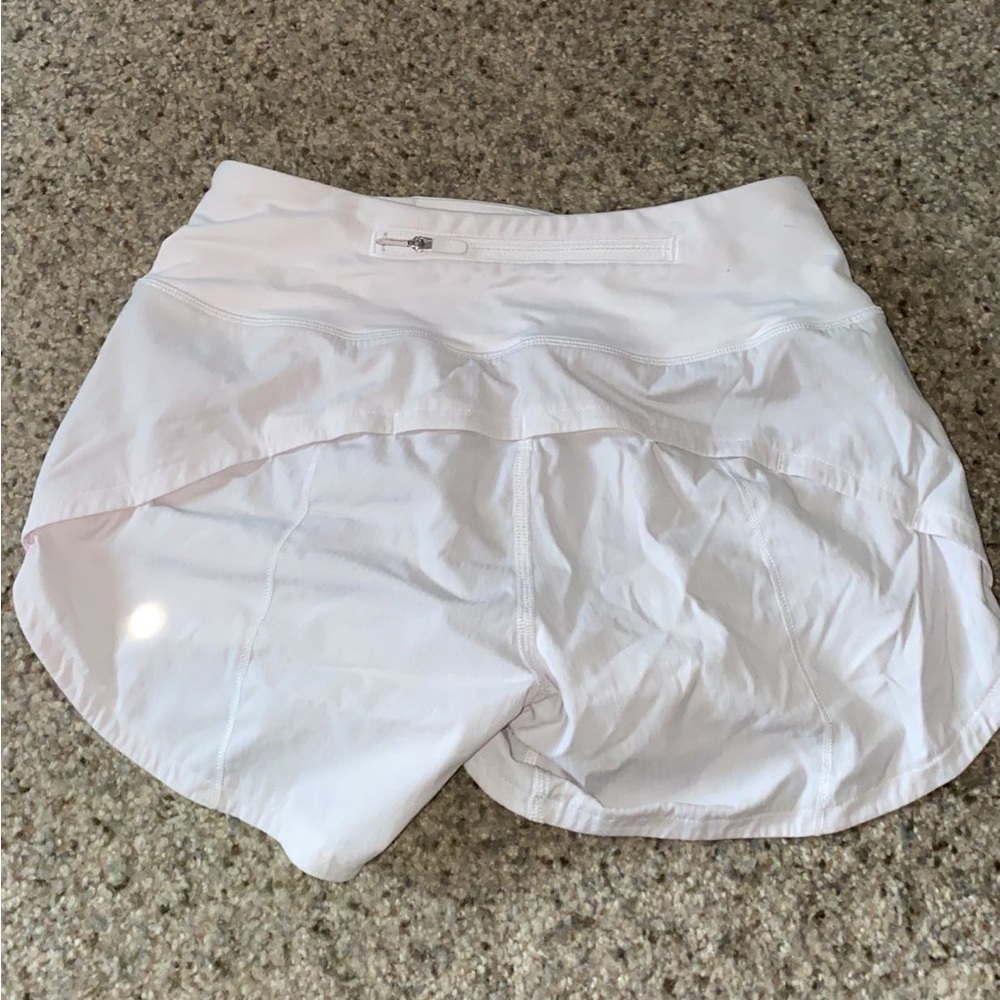 Lululemon white speed up shorts 4 inch size 0
